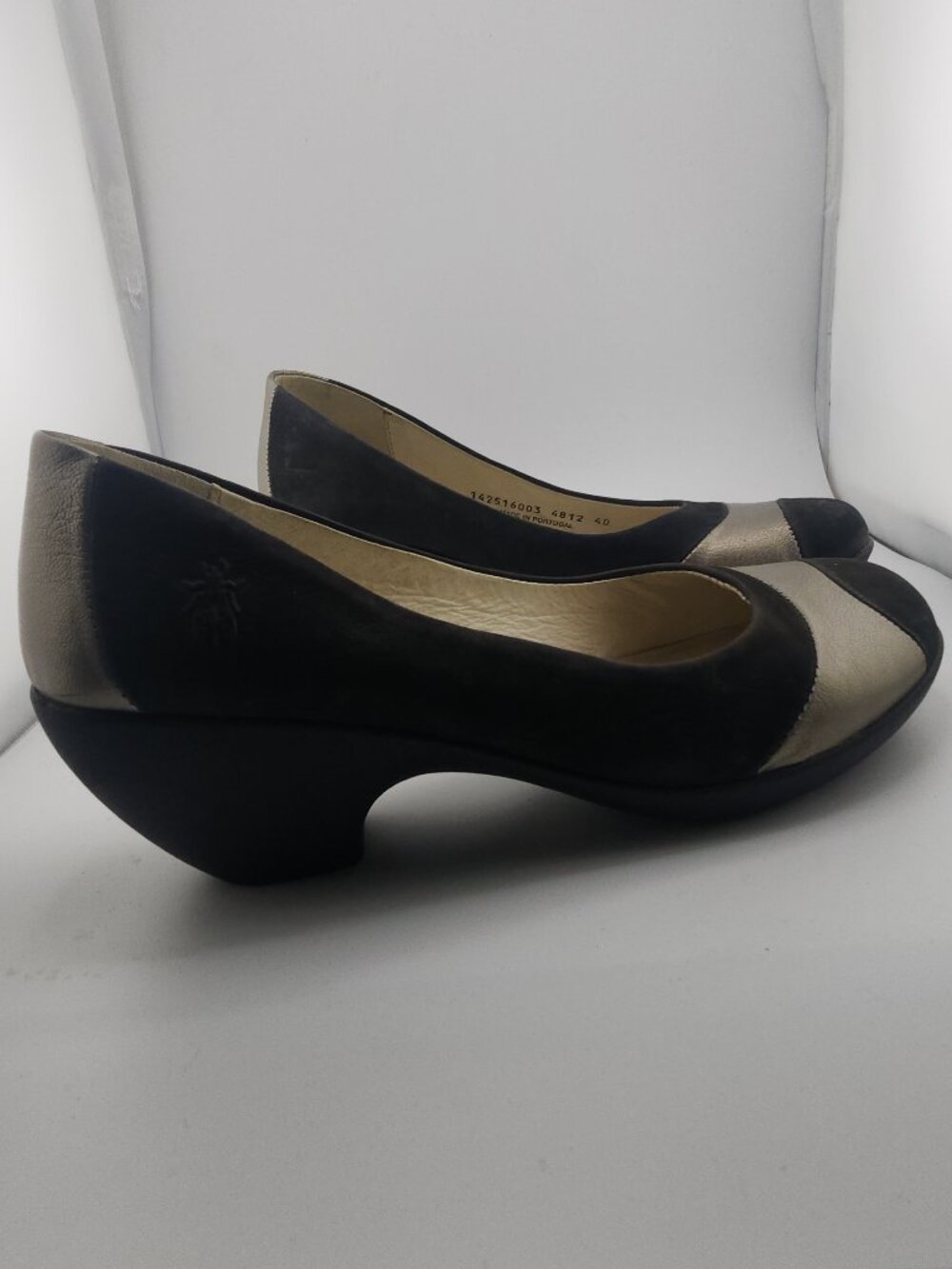 Fly London Black and Metallic Taupe Two-Tone Wedge Heels